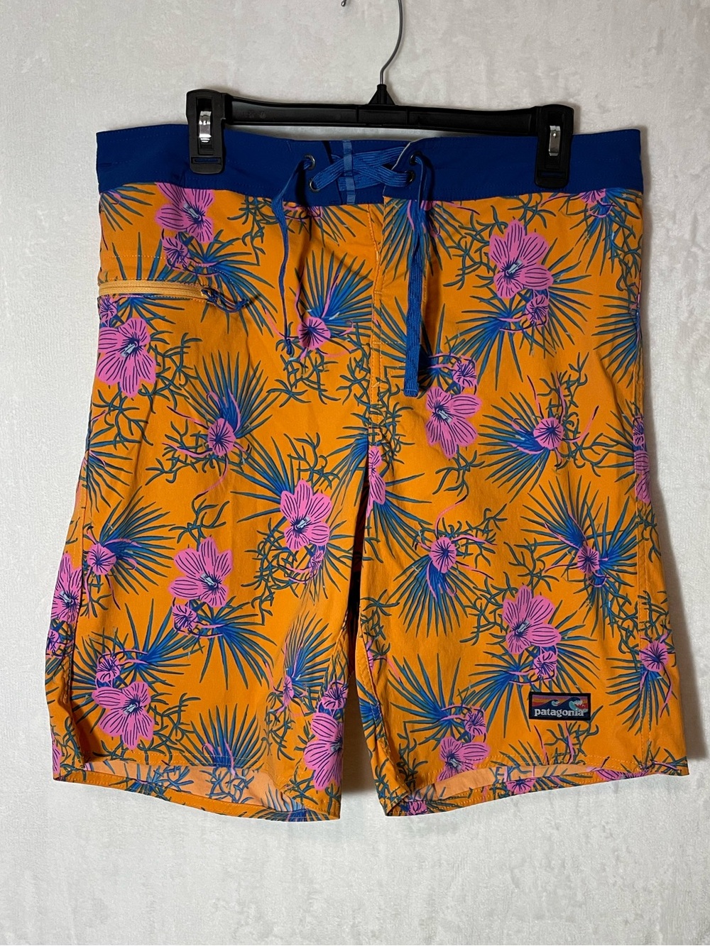 Patagonia Men’s Orange Floral Boardshorts with Blue Waistband
